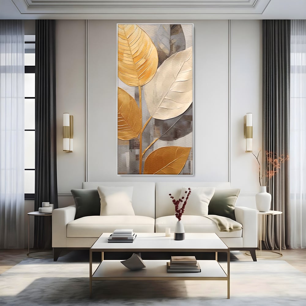 Tablou canvas cu tablou canvas cu frunze aurii texturate, in rama de aluminiu argintiu, pe perete intr-un living